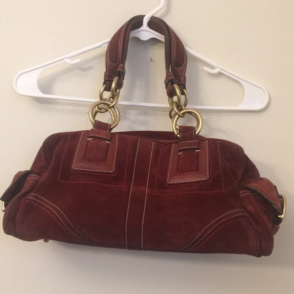 Red suede coach zip bag